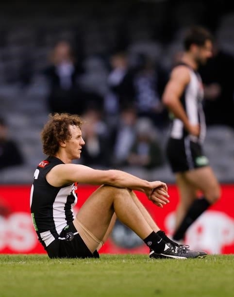 Chris Mayne looks dejected after a loss during the 2021 AFL Round 15 match between the Collingwood Magpies and the Fremantle Dockers at Marvel...