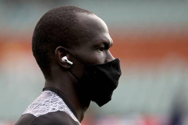 Aliir Aliir of the Power warms up during the 2021 AFL Round 15 match between the Port Adelaide Power and the Sydney Swans at Adelaide Oval on June...