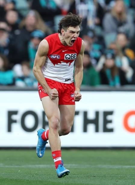Errol Gulden of the Swans celebrates a goal during the 2021 AFL Round 15 match between the Port Adelaide Power and the Sydney Swans at Adelaide Oval...