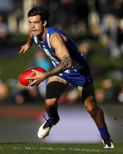 Jy Simpkin of the Kangaroos in action during the 2021 AFL Round 15 match between the North Melbourne Kangaroos and the Gold Coast Suns at Blundstone...
