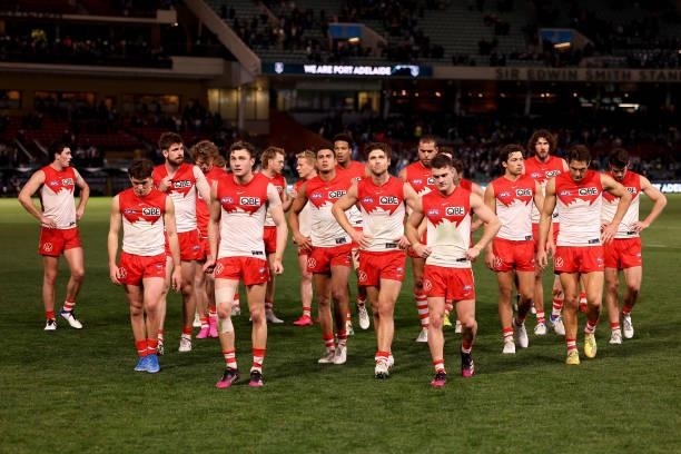 The Swans after their loss during the 2021 AFL Round 15 match between the Port Adelaide Power and the Sydney Swans at Adelaide Oval on June 26, 2021...
