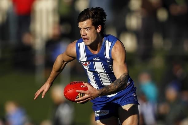 Jy Simpkin of the Kangaroos in action during the 2021 AFL Round 15 match between the North Melbourne Kangaroos and the Gold Coast Suns at Blundstone...