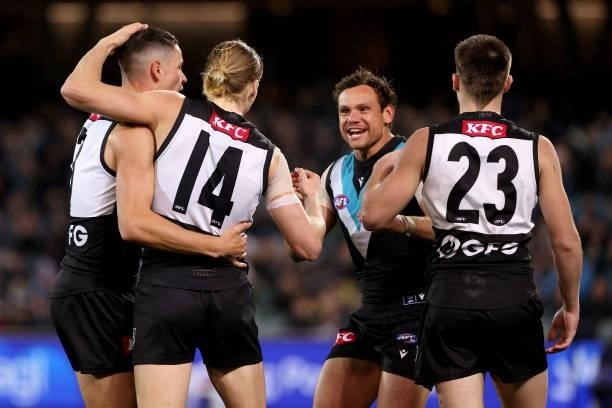 Miles Bergman of the Power celebrates a goal during the 2021 AFL Round 15 match between the Port Adelaide Power and the Sydney Swans at Adelaide Oval...