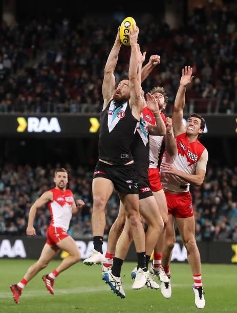 Charlie Dixon of the Power marks the ball during the 2021 AFL Round 15 match between the Port Adelaide Power and the Sydney Swans at Adelaide Oval on...