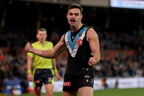 Karl Amon of the Power celebrates their win during the 2021 AFL Round 15 match between the Port Adelaide Power and the Sydney Swans at Adelaide Oval...