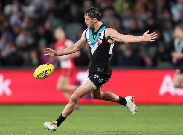 Travis Boak of the Power in action during the 2021 AFL Round 15 match between the Port Adelaide Power and the Sydney Swans at Adelaide Oval on June...