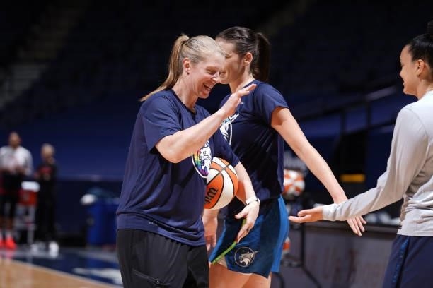 Assistant Coach, Katie Smith of the Minnesota Lynx high fives a player before the game against the Las Vegas Aces on June 25, 2021 at Target Center...