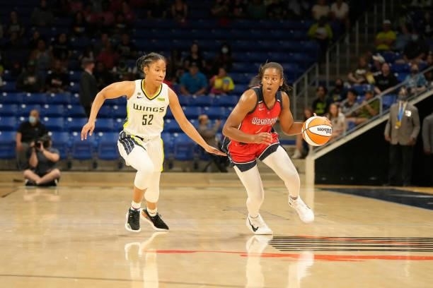 Tyasha Harris of the Dallas Wings plays defense on Ariel Atkins of the Washington Mystics on June 26, 2021 at the College Park Center in Arlington,...