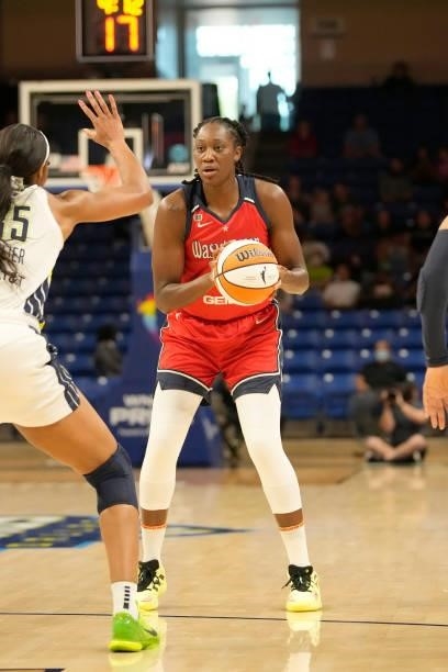Tina Charles of the Washington Mystics handles the ball against the Dallas Wings on June 26, 2021 at the College Park Center in Arlington, Texas....