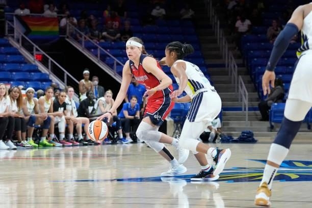 Sydney Wiese of the Washington Mystics dribbles the ball against the Dallas Wings on June 26, 2021 at the College Park Center in Arlington, Texas....