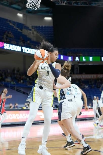 Satou Sabally of the Dallas Wings handles the ball against the Washington Mystics on June 26, 2021 at the College Park Center in Arlington, Texas....