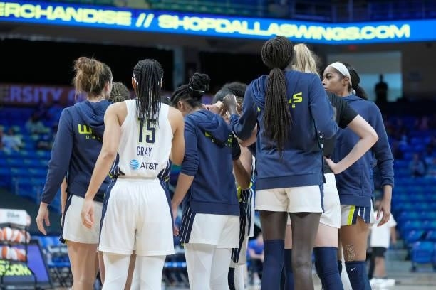 The Dallas Wings huddle up before the game against the Washington Mystics on June 26, 2021 at the College Park Center in Arlington, Texas. NOTE TO...