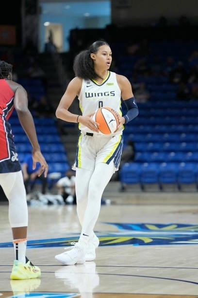 Satou Sabally of the Dallas Wings handles the ball against the Washington Mystics on June 26, 2021 at the College Park Center in Arlington, Texas....