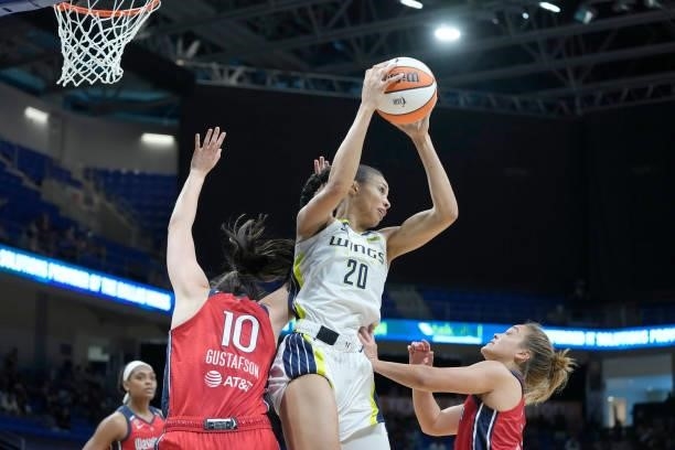 Isabelle Harrison of the Dallas Wings leaps for the ball against the Washington Mystics on June 26, 2021 at the College Park Center in Arlington,...