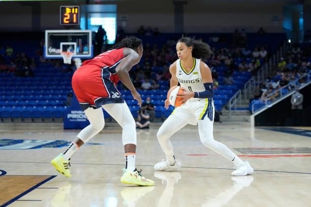 Tina Charles of the Washington Mystics plays defense on Satou Sabally of the Dallas Wings on June 26, 2021 at the College Park Center in Arlington,...