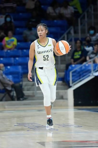 Tyasha Harris of the Dallas Wings dribbles the ball against the Washington Mystics on June 26, 2021 at the College Park Center in Arlington, Texas....