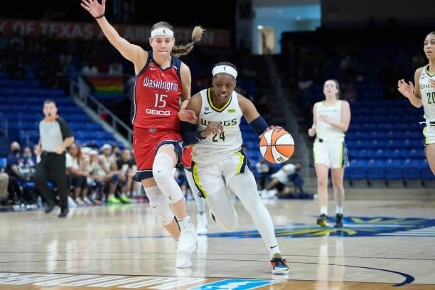 Sydney Wiese of the Washington Mystics plays defense on Arike Ogunbowale of the Dallas Wings on June 26, 2021 at the College Park Center in...