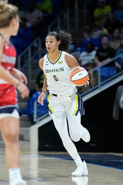 Satou Sabally of the Dallas Wings dribbles the ball against the Washington Mystics on June 26, 2021 at the College Park Center in Arlington, Texas....