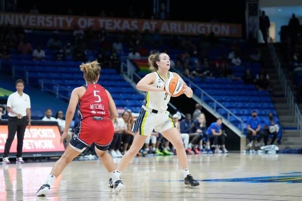 Marina Mabrey of the Dallas Wings passes the ball during the game against the Washington Mystics on June 26, 2021 at the College Park Center in...