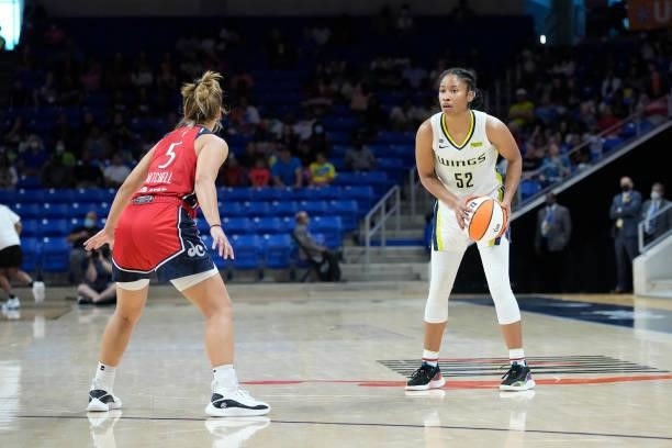 Leilani Mitchell of the Washington Mystics plays defense on Tyasha Harris of the Dallas Wings on June 26, 2021 at the College Park Center in...