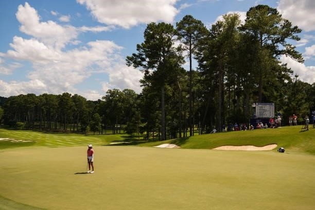 Celine Boutier of France reacts to her putt on the 16th hole during the third round for the 2021 KPMG Women's Championship at the Atlanta Athletic...