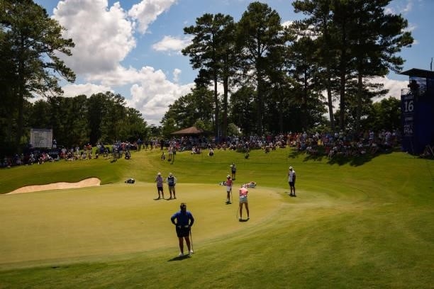 Nelly Korda makes her putt on the 16th hole during the third round for the 2021 KPMG Women's Championship at the Atlanta Athletic Club on June 26,...