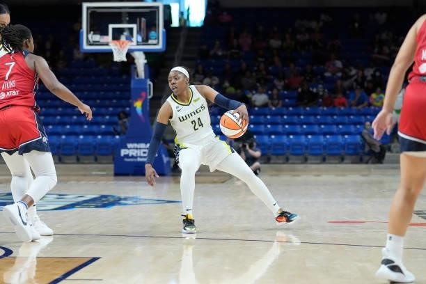Arike Ogunbowale of the Dallas Wings handles the ball against the Washington Mystics on June 26, 2021 at the College Park Center in Arlington, Texas....