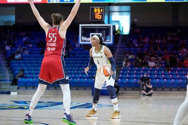 Theresa Plaisance of the Washington Mystics plays defense on Kayla Thornton of the Dallas Wings on June 26, 2021 at the College Park Center in...