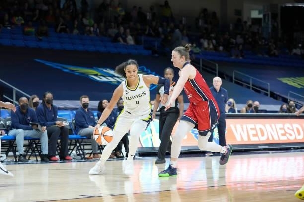 Satou Sabally of the Dallas Wings dribbles the ball during the game against the Washington Mystics on June 26, 2021 at the College Park Center in...
