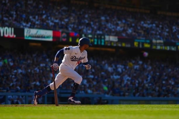 Mookie Betts of the Los Angeles Dodgers runs to first during the game between the Chicago Cubs and the Los Angeles Dodgers at Dodgers Stadium on...