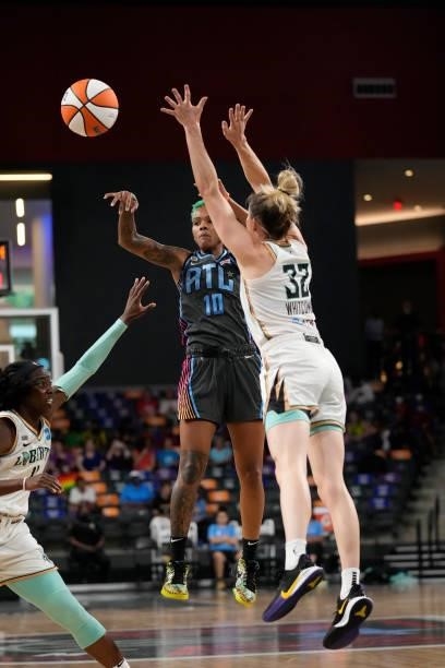 Courtney Williams of the Atlanta Dream passes the ball against the New York Liberty on June 26, 2021 at Gateway Center Arena in College Park,...