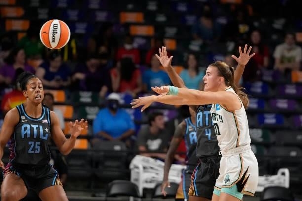 Sabrina Ionescu of the New York Liberty passes the ball against the Atlanta Dream on June 26, 2021 at Gateway Center Arena in College Park, Georgia....