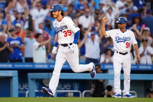 Cody Bellinger of the Los Angeles Dodgers jogs the bases after hitting a walk-off home run during the game between the Chicago Cubs and the Los...