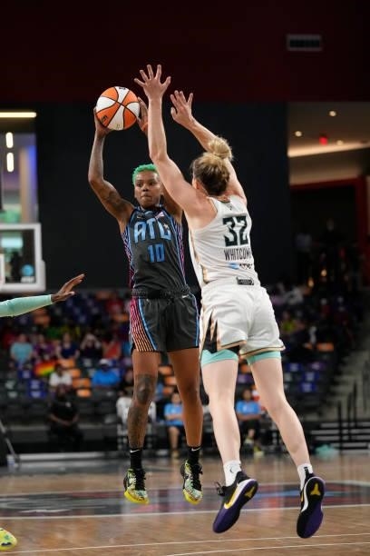 Courtney Williams of the Atlanta Dream looks to pass the ball against the New York Liberty on June 26, 2021 at Gateway Center Arena in College Park,...
