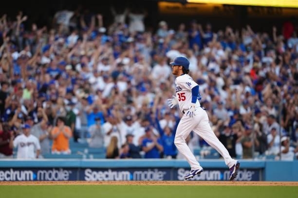Cody Bellinger of the Los Angeles Dodgers jogs the bases after hitting a walk-off home run during the game between the Chicago Cubs and the Los...