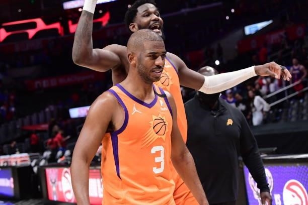 Deandre Ayton of the Phoenix Suns and Chris Paul of the Phoenix Suns walk off the court after the game against the LA Clippers during Game 4 of the...