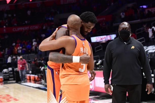Deandre Ayton of the Phoenix Suns hugs Chris Paul of the Phoenix Suns after the game against the LA Clippers during Game 4 of the Western Conference...