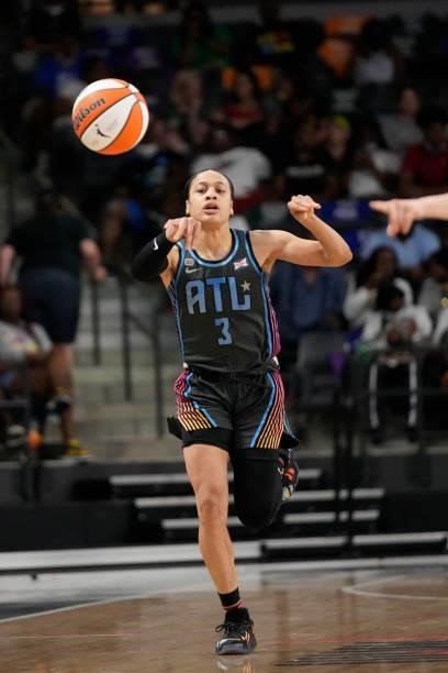 Chennedy Carter of the Atlanta Dream passes the ball against the New York Liberty on June 26, 2021 at Gateway Center Arena in College Park, Georgia....