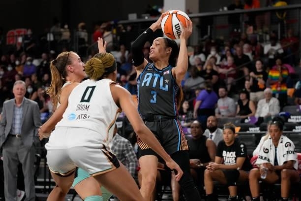Chennedy Carter of the Atlanta Dream looks to pass the ball against the New York Liberty on June 26, 2021 at Gateway Center Arena in College Park,...