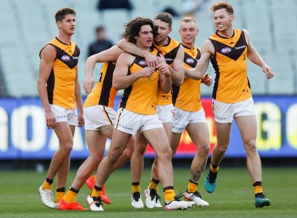 Jai Newcombe celebrates a goal with teammates during the 2021 AFL Round 15 match between the GWS Giants and the Hawthorn Hawks at the Melbourne...