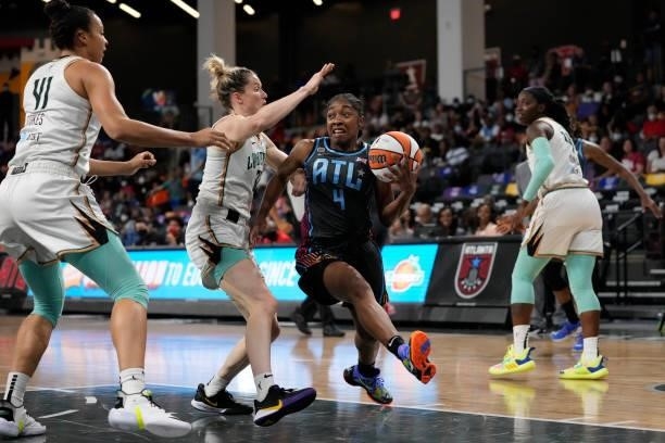 Aari McDonald of the Atlanta Dream drives to the basket against the New York Liberty on June 26, 2021 at Gateway Center Arena in College Park,...