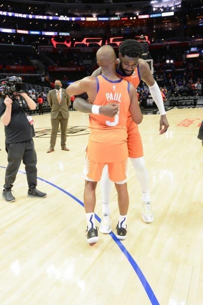 Chris Paul of the Phoenix Suns hugs Deandre Ayton of the Phoenix Suns after the game against the LA Clippers during Game 4 of the Western Conference...