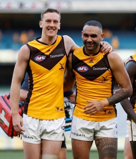 Denver Grainger-Barras and Shaun Burgoyne of the Hawks celebrate during the 2021 AFL Round 15 match between the GWS Giants and the Hawthorn Hawks at...