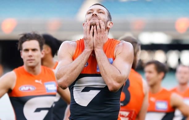 Sam J. Reid of the Giants looks dejected after a loss during the 2021 AFL Round 15 match between the GWS Giants and the Hawthorn Hawks at the...