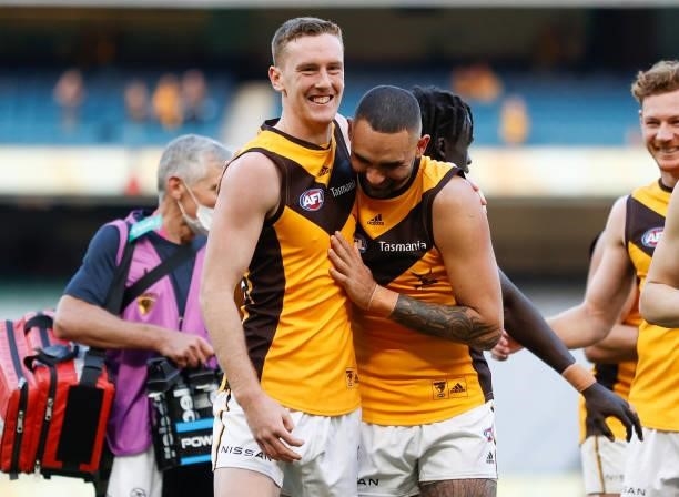 Denver Grainger-Barras and Shaun Burgoyne of the Hawks celebrate during the 2021 AFL Round 15 match between the GWS Giants and the Hawthorn Hawks at...