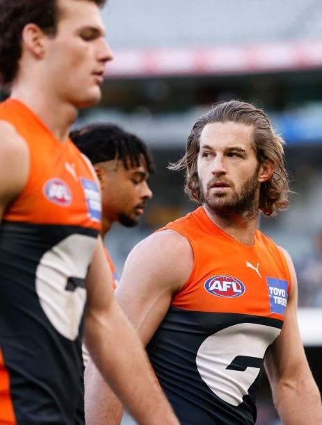 Callan Ward of the Giants looks dejected after a loss during the 2021 AFL Round 15 match between the GWS Giants and the Hawthorn Hawks at the...