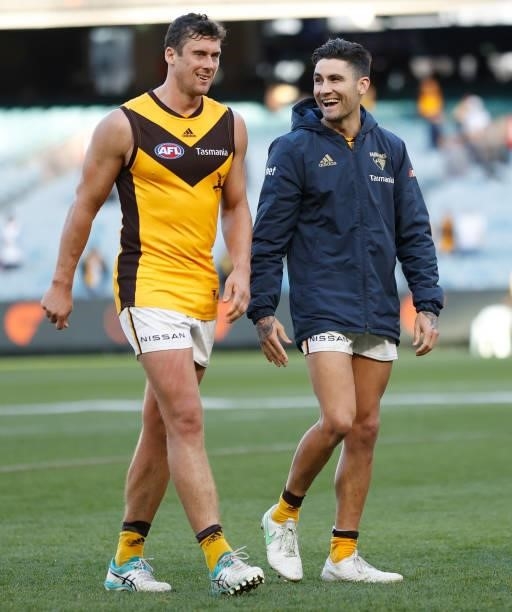 Kyle Hartigan and Chad Wingard of the Hawks look on during the 2021 AFL Round 15 match between the GWS Giants and the Hawthorn Hawks at the Melbourne...