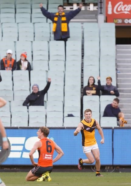 Dylan Moore of the Hawks celebrates a goal during the 2021 AFL Round 15 match between the GWS Giants and the Hawthorn Hawks at the Melbourne Cricket...