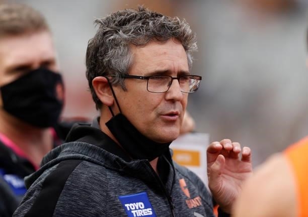 Leon Cameron, Senior Coach of the Giants addresses his players during the 2021 AFL Round 15 match between the GWS Giants and the Hawthorn Hawks at...