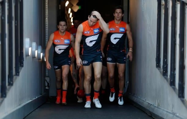 Toby Greene of the Giants leads his team up the race during the 2021 AFL Round 15 match between the GWS Giants and the Hawthorn Hawks at the...